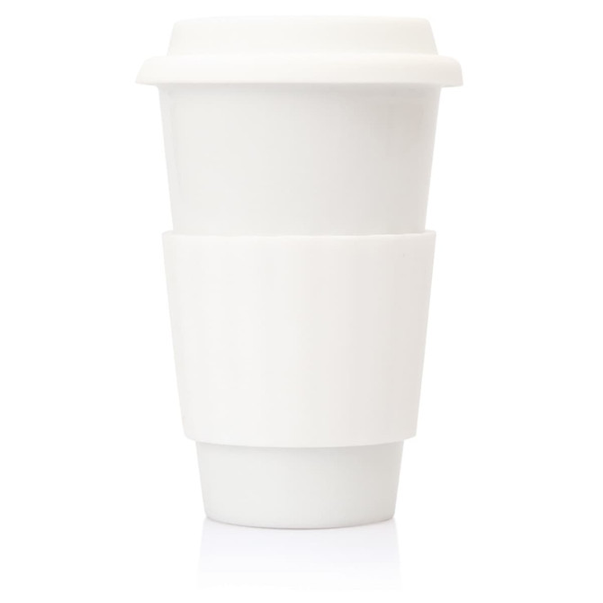 A white ceramic travel mug with a silicone sleeve and lid, featuring a simple, sleek design.