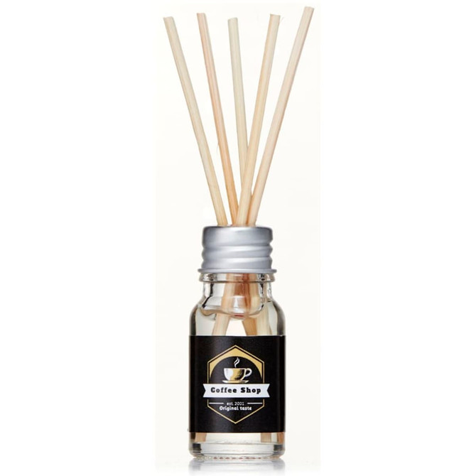 A 10ml clear glass reed diffuser with wooden sticks and a black and silver label featuring a logo.