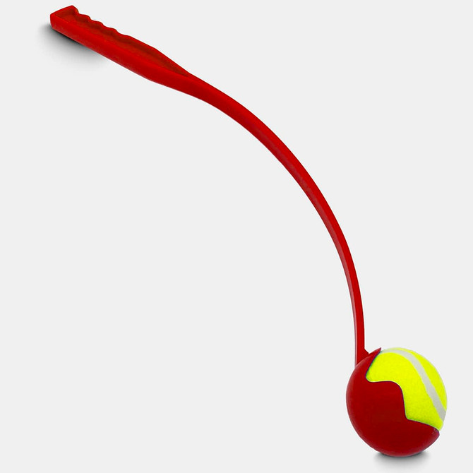 A red ball launcher with a curved handle and a yellow tennis ball attached. It features a logo on the launcher.