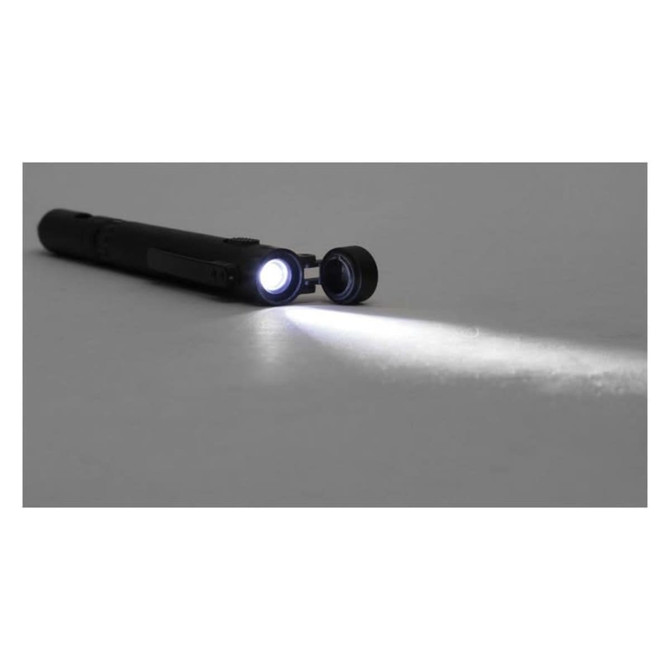 A black stylus pen with a retractable flashlight feature, casting a beam of light onto a surface.