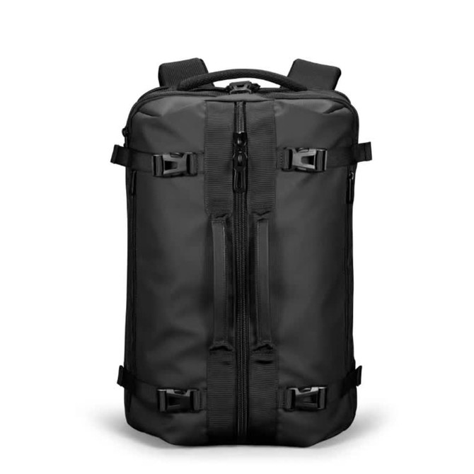 A black backpack featuring multiple straps and zippers, with a logo on the front.