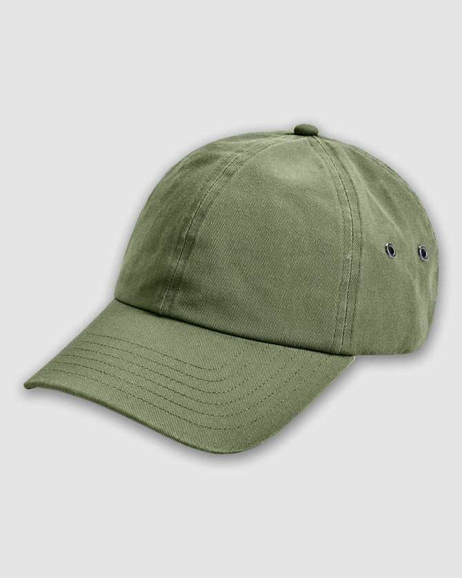 A green washed baseball cap featuring a logo and ventilation eyelets on the sides.