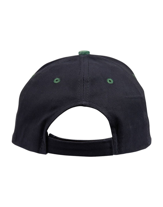 A navy suede peak cap with a green button and eyelets, featuring an adjustable strap at the back.