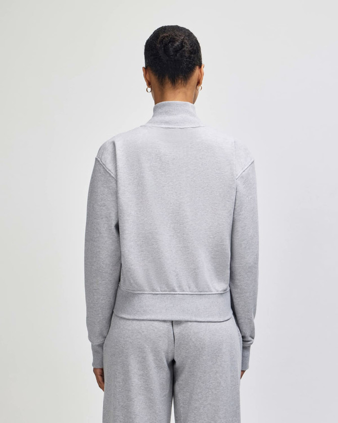 A grey French Terry women's full-zip jacket, viewed from the back, featuring a simple design and no visible branding.
