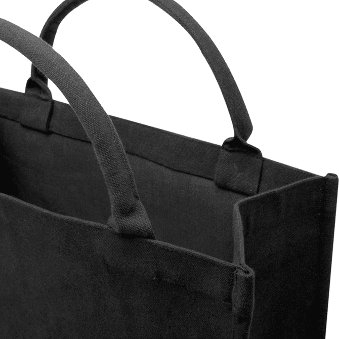 A black recycled tote bag with sturdy handles and an open top, featuring a simple design.