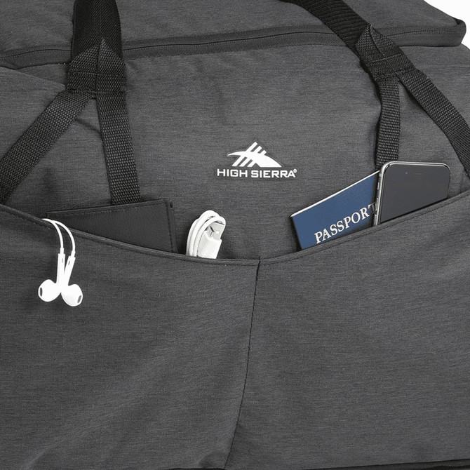 A grey duffle bag with a logo, featuring pockets containing a phone, charger, and passport.