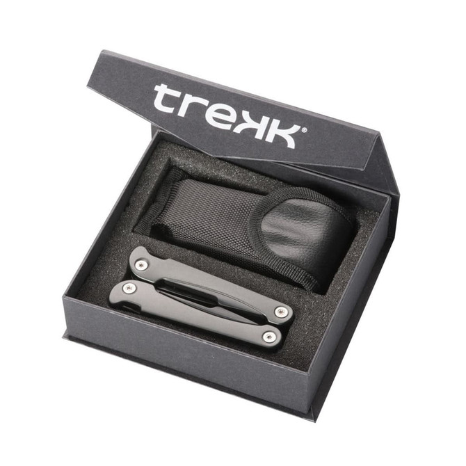 A multi-tool in a black box with a protective foam insert and a black pouch, featuring a logo on the box.