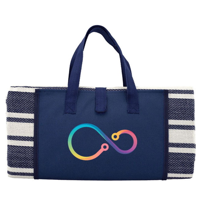A navy blue picnic rug with a striped design and a colourful logo. It features sturdy handles for carrying.