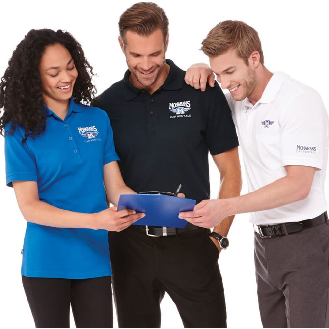 A group of three individuals wearing Crandall short sleeve polo shirts in blue, black, and white, featuring a logo.