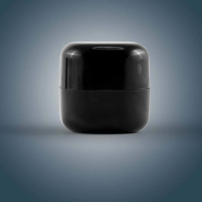 A black Cube Lip Balm container with a smooth, rounded design.