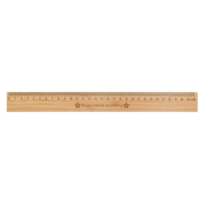 A bamboo 30cm ruler featuring engraved markings and a logo, in a natural wood colour.