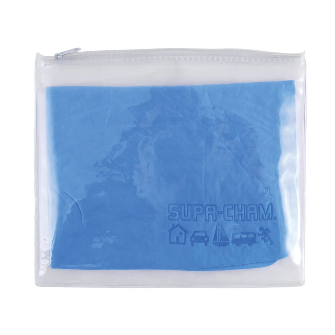 A pouch containing a blue Supa Cham chamois. The pouch features a transparent design with a zip closure and branding.