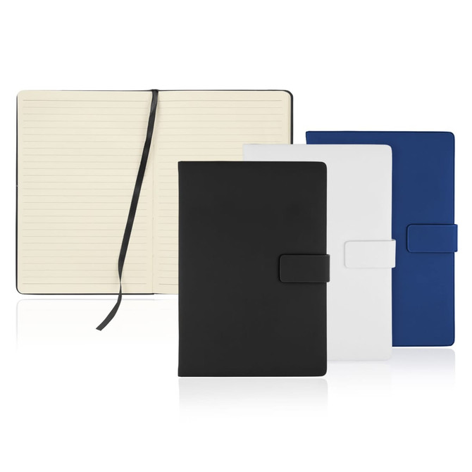 A set of A5 notebook journals with magnetic closures in black, white, and blue, featuring lined pages and a ribbon marker.