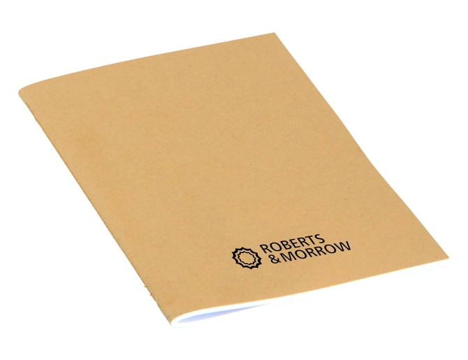 A Kraft A5 notebook in a brown cover, featuring a logo on the front. Blank pages inside for note-taking.