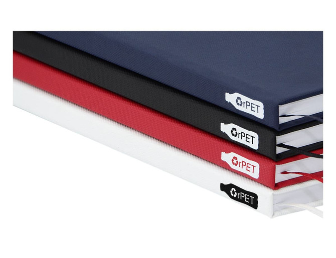 A collection of A5 notebooks in navy, black, red, and white, featuring branding on the spines.