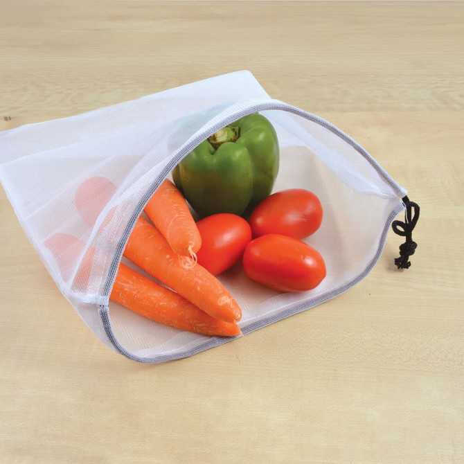 A drawstring bag in white mesh containing carrots, cherry tomatoes, and a green bell pepper. Features a black drawstring.