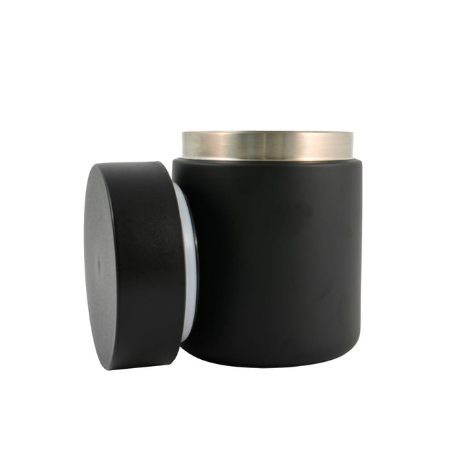 A black food container with a silver lid and a separate black base. It has a sleek, modern design.