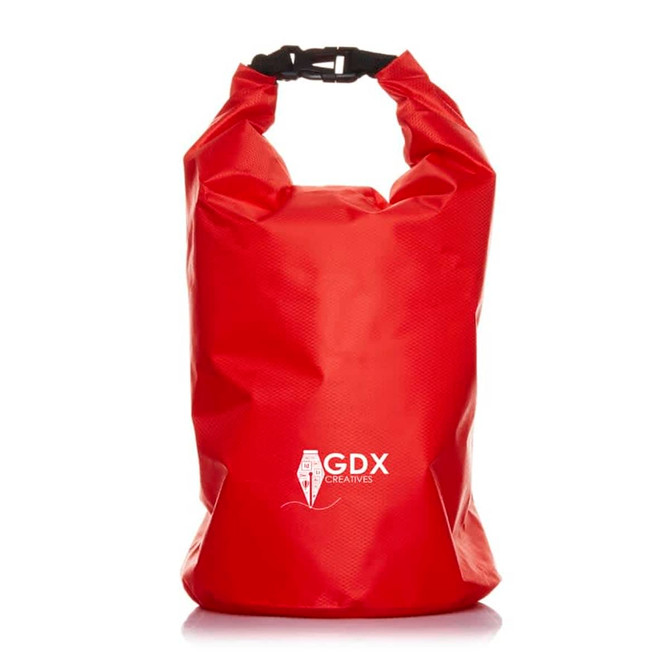 A red dry bag with a secure top buckle and a logo on the front.