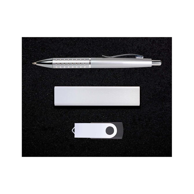 A silver pen, a silver USB drive, and a silver cardholder arranged on a black surface.