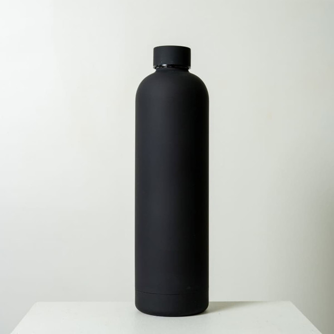 A drink bottle with a sleek black matte finish, featuring a cylindrical design and a screw-on cap.