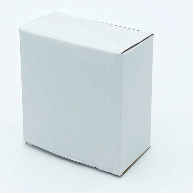 A small white cardboard box with a plain design, featuring a flap closure at the top.