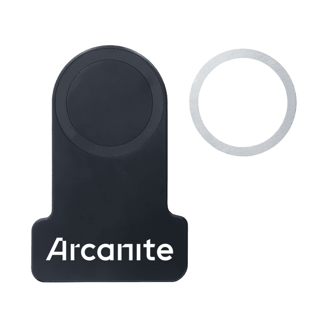 A wireless charger in black with a metallic ring and a logo.