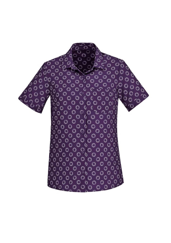 A purple short sleeve shirt featuring a white daisy print and a button-up design. It includes a logo on the product.