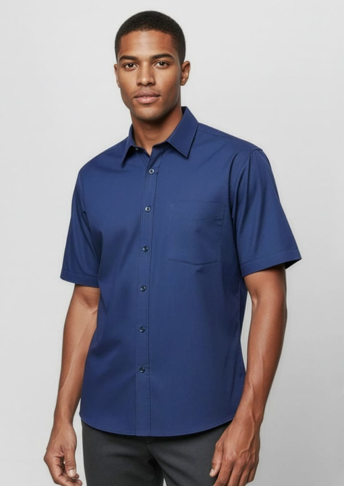 A navy short sleeve button-up shirt with a collar and single chest pocket, featuring a subtle micro check pattern.