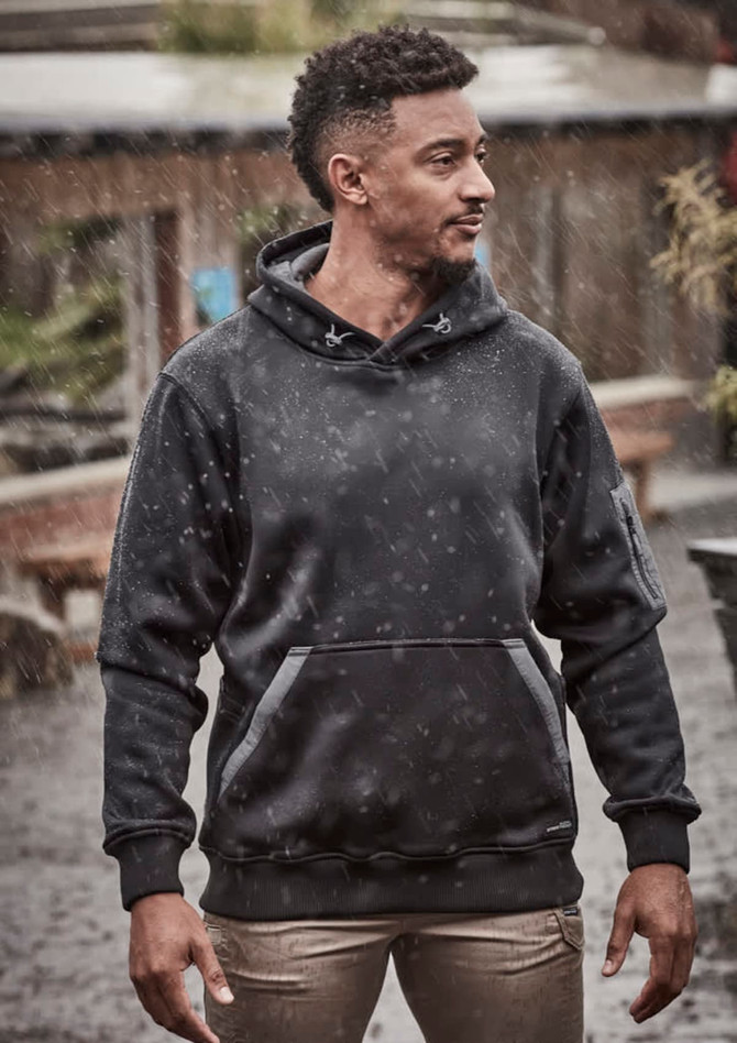 A unisex water-resistant hoodie in black, featuring a hood and front pockets, worn by a model outdoors.