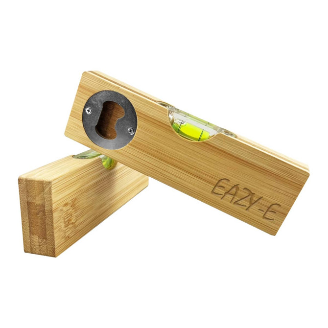 A drink bottle opener made of bamboo with a built-in leveller, featuring a circular opening and a green bubble level.
