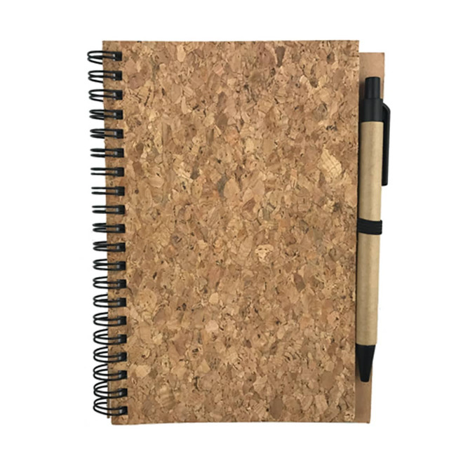 A cork notebook with a black spiral binding and a brown pen attached.