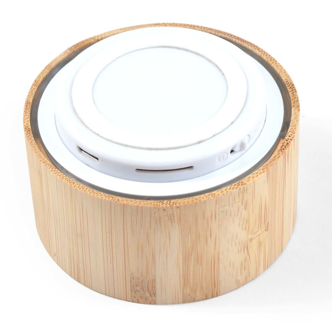 A bamboo Bluetooth speaker featuring a round, sleek design with a white speaker top.