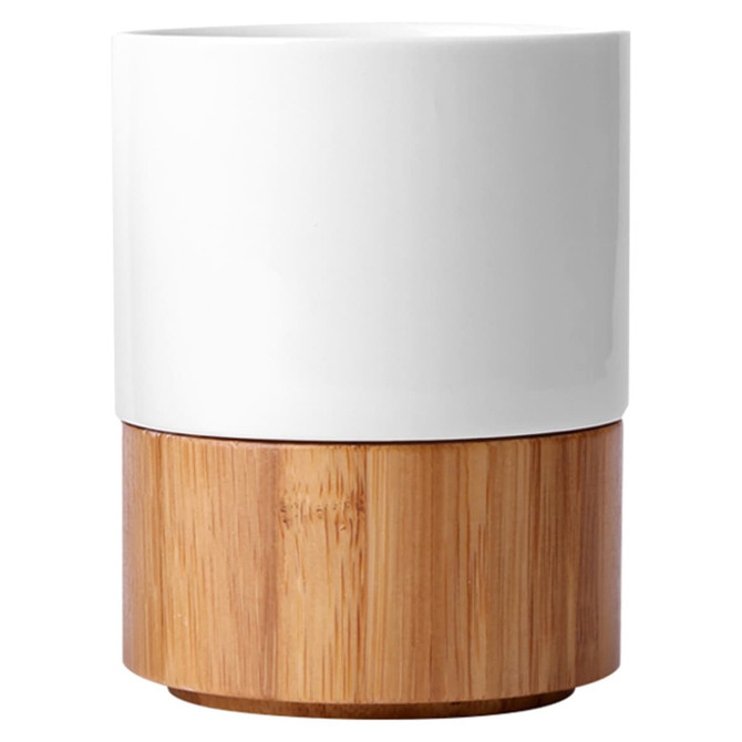 A ceramic mug with a white top and a natural bamboo base, featuring a simple, modern design. 