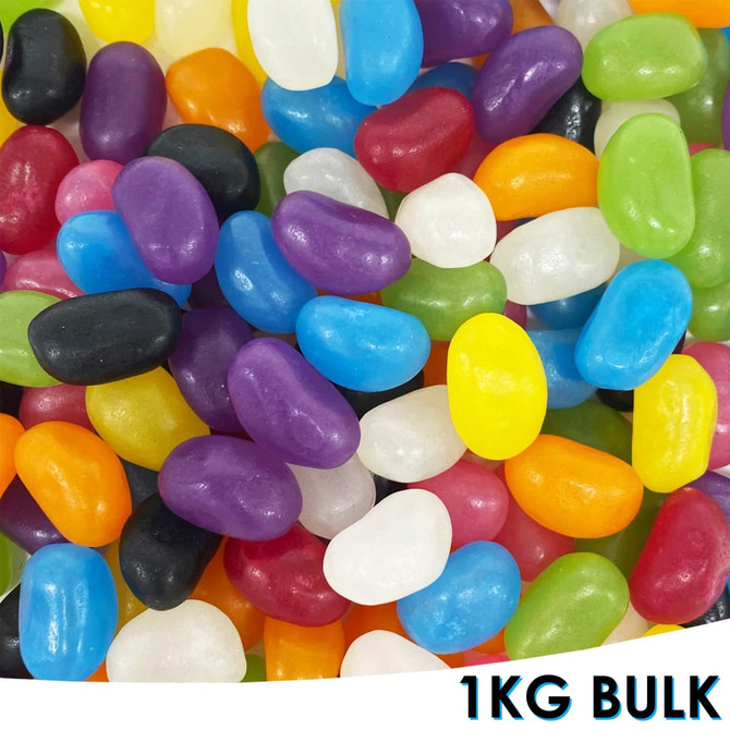 A variety of colourful jelly beans in assorted shades, including purple, yellow, green, and orange, in bulk.