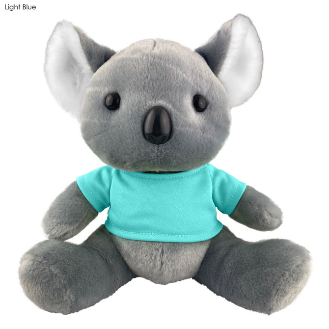 A grey koala plush toy wearing a light blue shirt, featuring black eyes and ears. It has a soft, cuddly appearance.