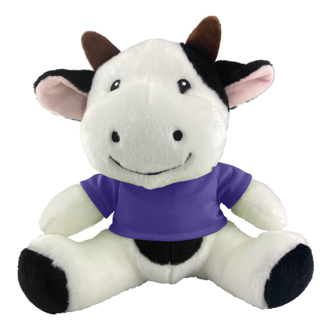 A plush cow toy featuring a black and white design, wearing a purple shirt and a friendly expression.