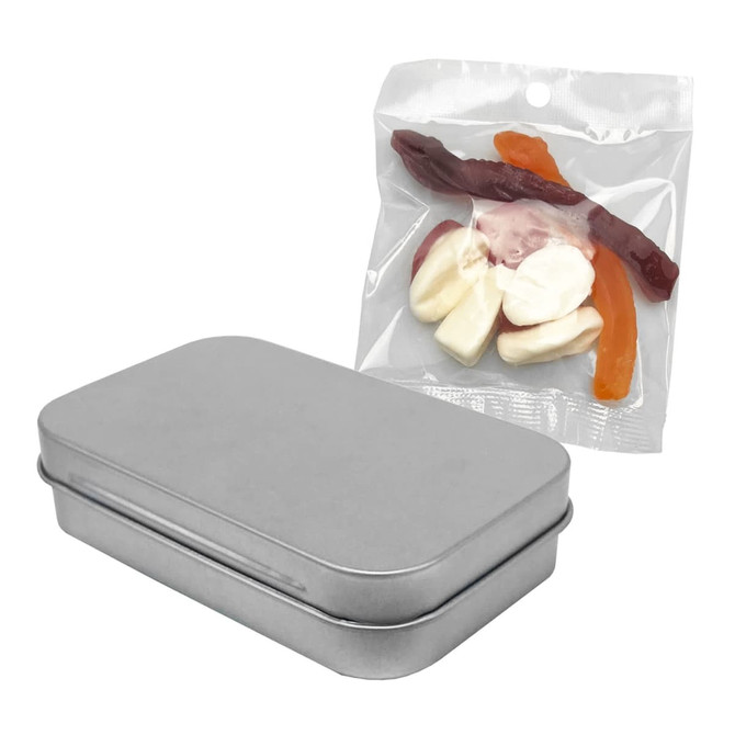 A metallic tin with a lid beside a transparent bag containing assorted jelly lollies in various colours.