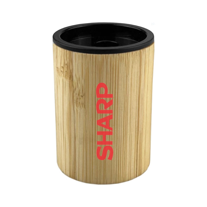 A bamboo pencil sharpener featuring a cylindrical design with a black top and a logo in red.