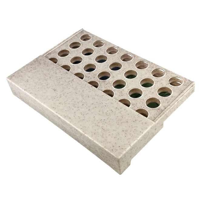A Wheat Straw Connect Four game in a light beige colour with circular playing slots and a smooth surface.