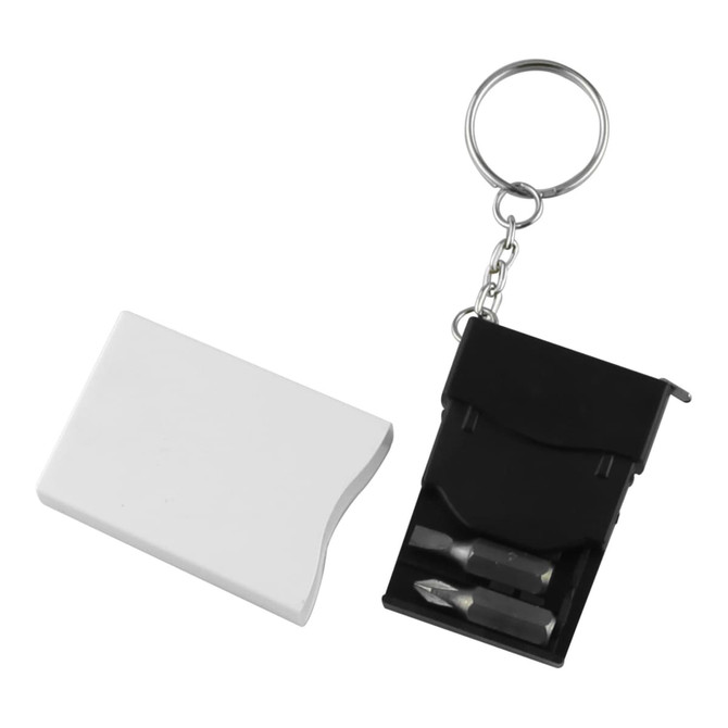 A white mini screwdriver tape key ring with a black compartment holding two screwdriver bits and a key ring attachment.