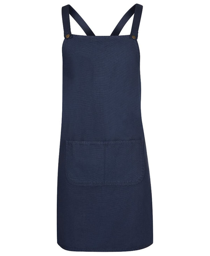 A navy blue cross back canvas apron featuring a front pocket and adjustable straps. Branding is present.