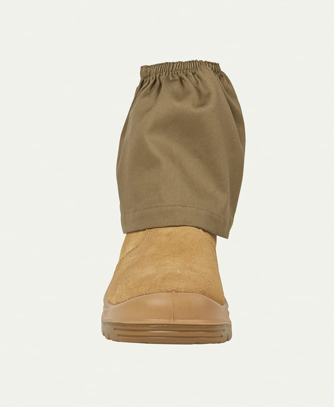 A tan boot with a khaki boot cover secured at the top. The cover features an elasticised opening.