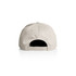 A beige cap with a black interior and an adjustable strap at the back. Features a logo.