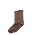 Two pairs of ribbed socks in a light brown colour, featuring a knitted design and a logo on one sock.