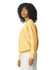 A side view of a woman wearing a yellow adult crewneck sweatshirt. The sweatshirt has long sleeves and a relaxed fit.