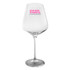 A clear wine glass with a wide bowl and tall stem, featuring a logo in pink.