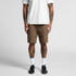 Canvas shorts in brown, featuring cargo pockets, shown on a model wearing a white T-shirt and black shoes.