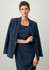 A double-breasted longline jacket in navy blue, featuring a tailored fit and structured silhouette.