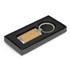 A wooden key ring with a metal attachment, presented in a black gift box with a foam insert.