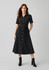 A black midi dress with short sleeves, a button-down front, and a belted waist, styled with ankle boots.